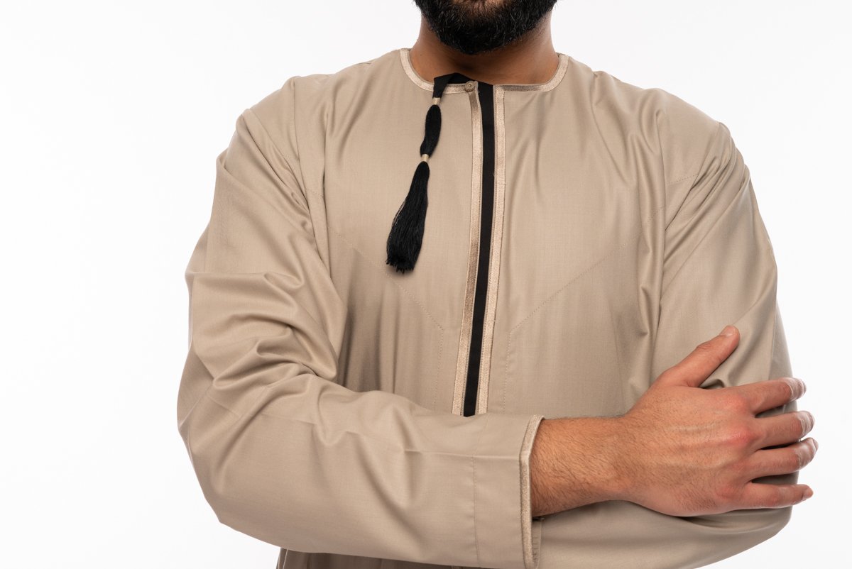beige thobe with tassle